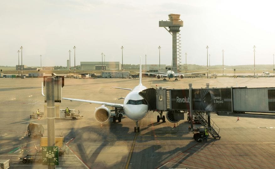 aeroplane boarding passengers on the runway