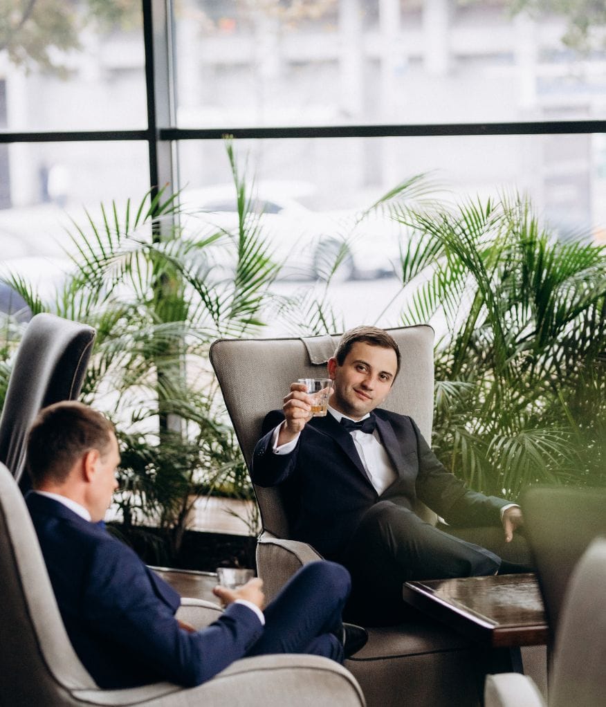 Two VIPs enjoying a drink