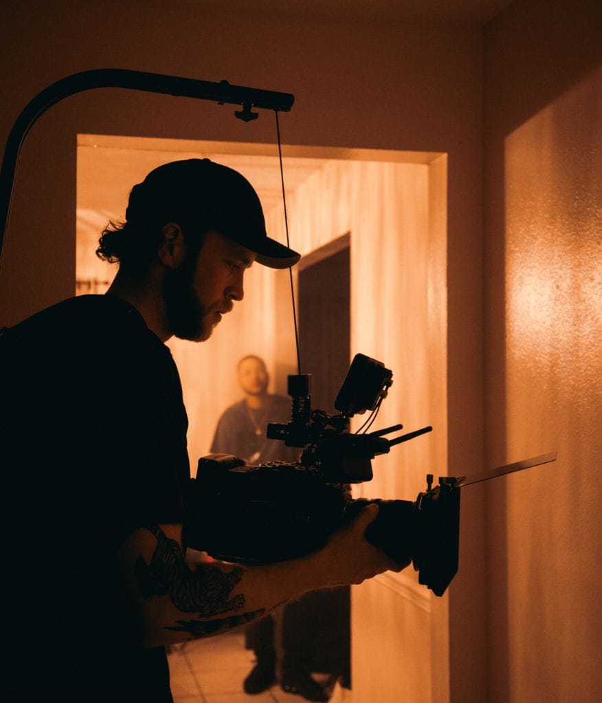 A videographer recording