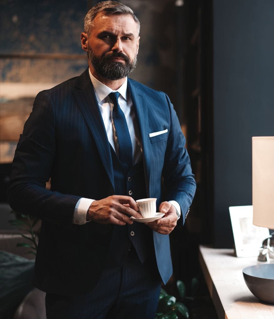 A VIP holding a cup of tea
